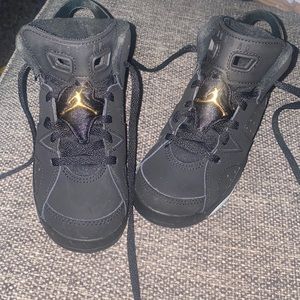 Black/gold/white Jordan’s